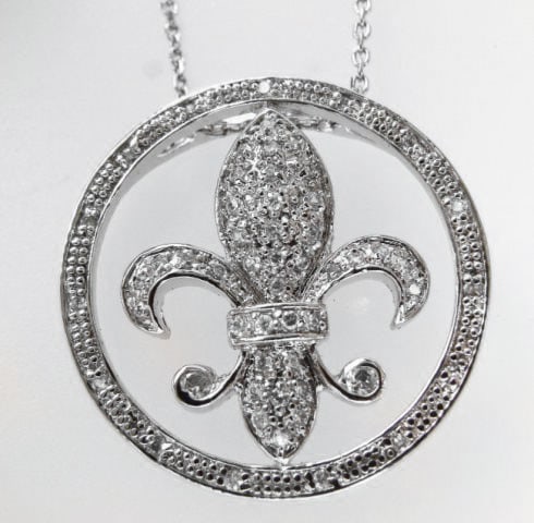 Fleur De Li Pendant Diamond Creation.55Ct 18kW/g: Fleur De Li Center Circle Pendants Diamonds Creation High Quality Quantity:1 Weight: .55 Carat Round Brilliant Clarity: VS, Color: F Length: H 1" x W 1"inch Thickness: 2.5 m 18k White Gold Overlay 925