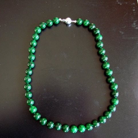 Natural Jadeite Jade Bead Green Spinach Necklace: Natural Jadeite Jade Qty: 1 Grade: A, Item: Necklace Origin: Beijing China (Mainland) Color: Charm Green Style: Single Strand Weight: 55.10 grams Measurement: 10 x 10 mm Length: 18" inc