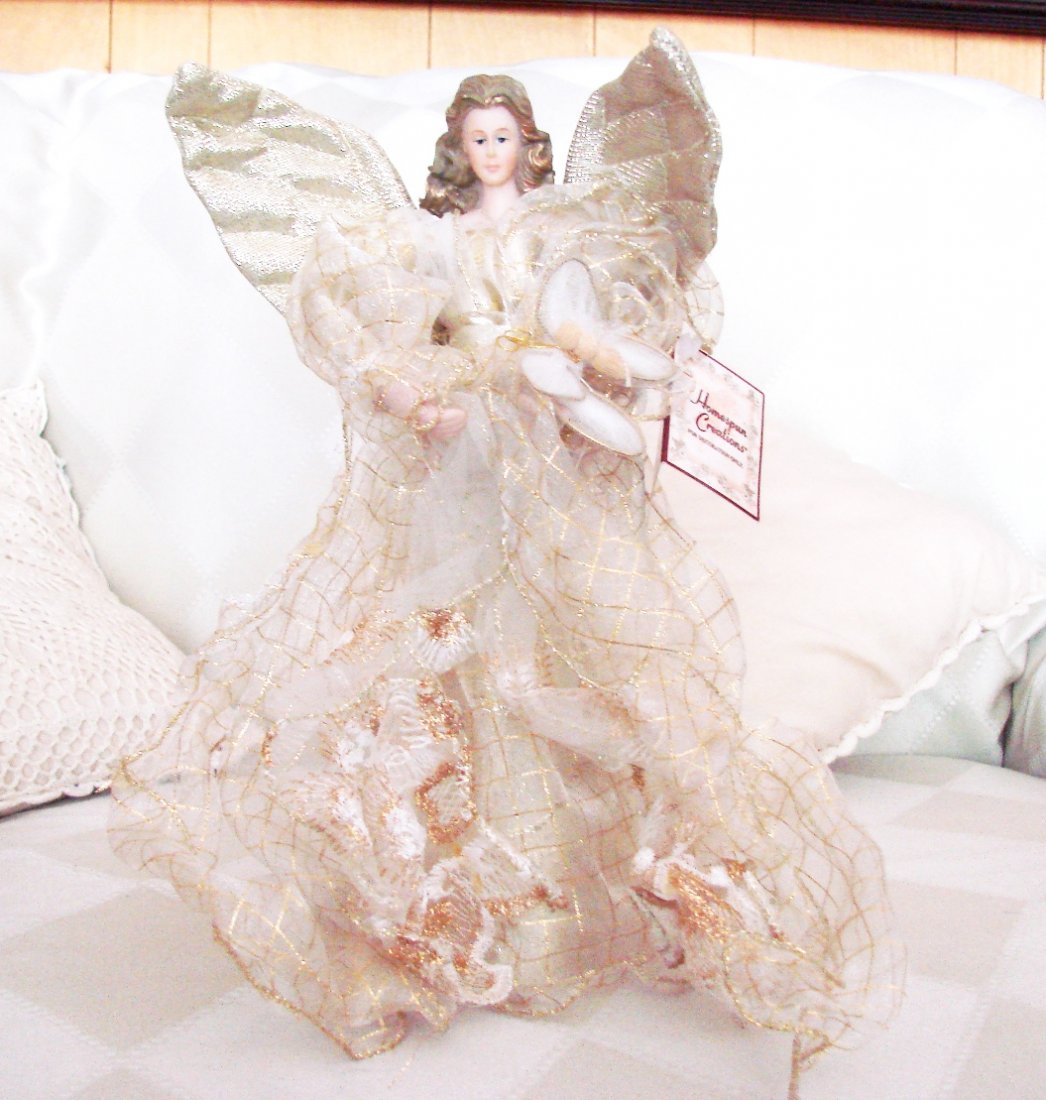 Kurt Adler 12"Inch Champag and Gold Fiber Optic Angle: Lighted Fiber Optic Animated Champag and Gold Angel Christmas Table Top Decoration Wings Angel wears an elegant silver gown 12"H x 7.1/4"W Estimated Value Price:$95 (This Item Ready Ship In Two Day) D