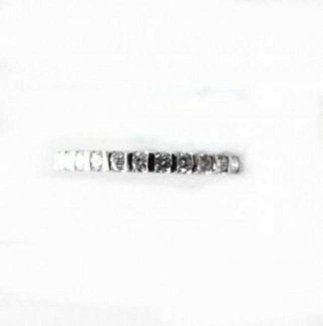 Wedding Ring Diamond : .29 Carat 18K White Gold: Gem Type: Natural Diamond Item: Ring (Size: 6.5) Band thickness: 2mm 11 Pieces Diamond Weight:.29 Carat Round Brilliant Clarity: SI1,Color: G, Treatment: None Metal: 18k white gold (2.35grm) Setting: 