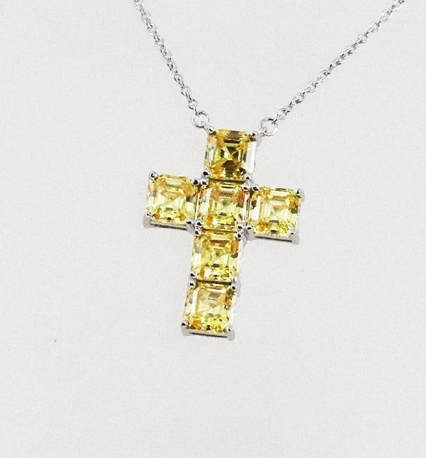 Cross Necklace Creation, Diamond 3.05 CT 18 K W/g Overlays 925: Gem Type: Creation, Fancy Yellow Diamond Item: Necklace Weight: 3.05 CT princess cut, Clarity: VS1, Color: Fancy Yellow Length: 18. Inches Pendant: Size 12x6mm Metal: 4.01 grams 18k white gold overlay