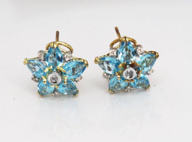 Swiss Blue Topaz Diamond Star Earrings 4.94Ct 14k Y/G: Gems: Natural Swiss Blue Topaz and Diamond 12 Pieces Diamond Weight: .14 Carat Round Brilliant Clarity: SI2, Color: G, Treament: None 10 Pieces Weight: 4.80 Carat Pear Shape Clarity: VS, Color: Swiss 