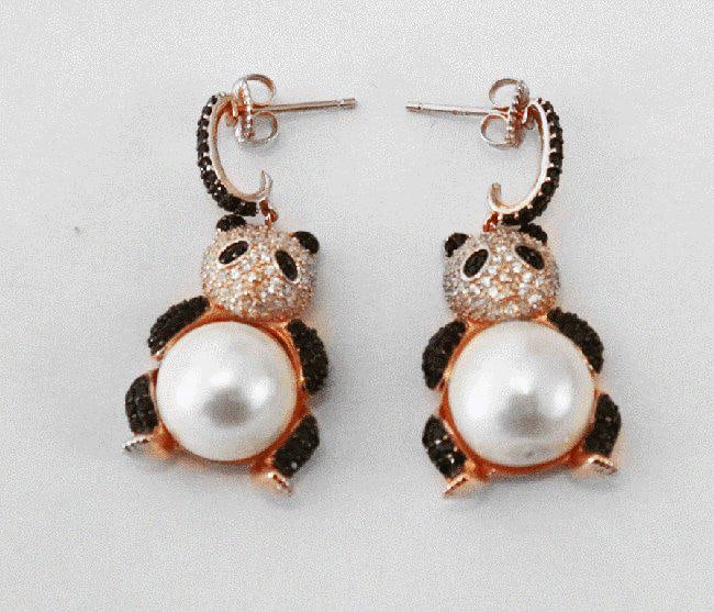 Tahitian Pearl Earrings 18k W/g Gold Overlay: Gem Type: Tahitian Pearl/ Creation, diamond Item: Earrings Creation, diamond: Approximately 4.30.10 Carat, Clarity: VS1, Color: F Tahitian Pearl: 14.5mm- Luster: very good Color: Black/Gray Length: 1.