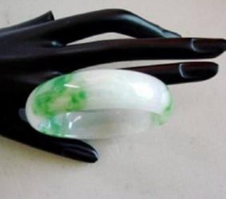 Natural Jade Bangle Grade A Size: 6.5: Remarks: Natural Jadeite Jade Item: Jade Bangle (Size: 6.5) Grade: A Weight: 70.40 gram Color: Emerald Green / Light Green Texture Transparency: Semi -Transparent Shape & Cut: Solid Jade/Halfway Round