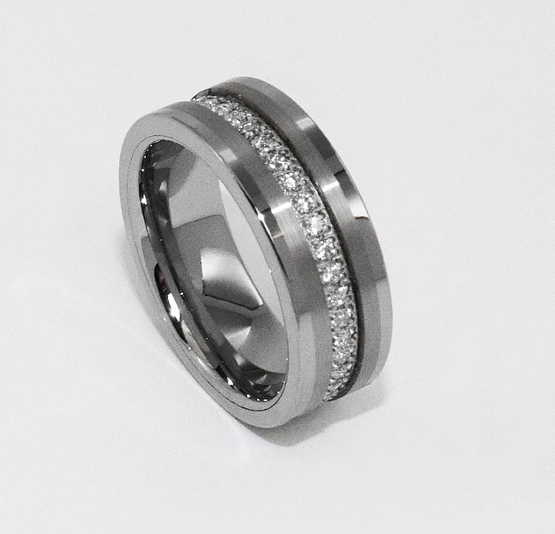 Tungsten Eternity Ring Creation Diamond .28 Carat: Item: Tungsten Comfort Ring Gem Type: Creation, Diamond Weight 1.40 carat round brilliant 52 pieces. Clarity: VSI, Color: H Setting: Prong Pipe-cut Brushed Center Condition: New