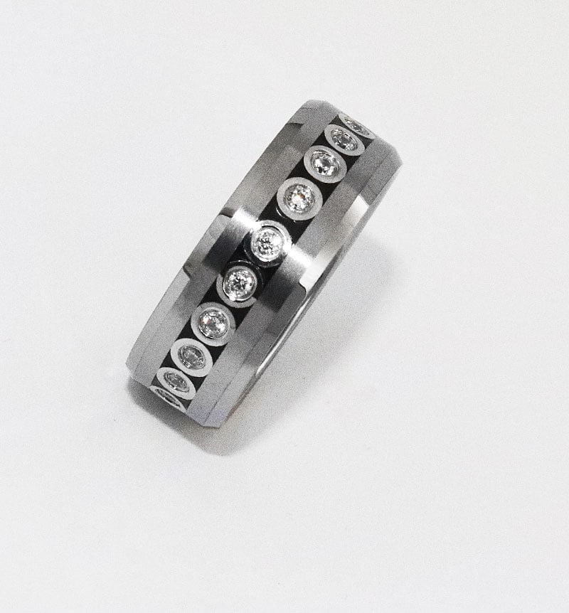 Tungsten Eternity Ring Creation .44 Carat: Item: Tungsten Comfort Ring Gem Type: Creation, Diamond Weight .44 carat round brilliant 22pieces. Clarity: VSI, Color: H Size: 10, Width: 8mm Setting: Prong Pipe-cut Brushed Center Condition: New