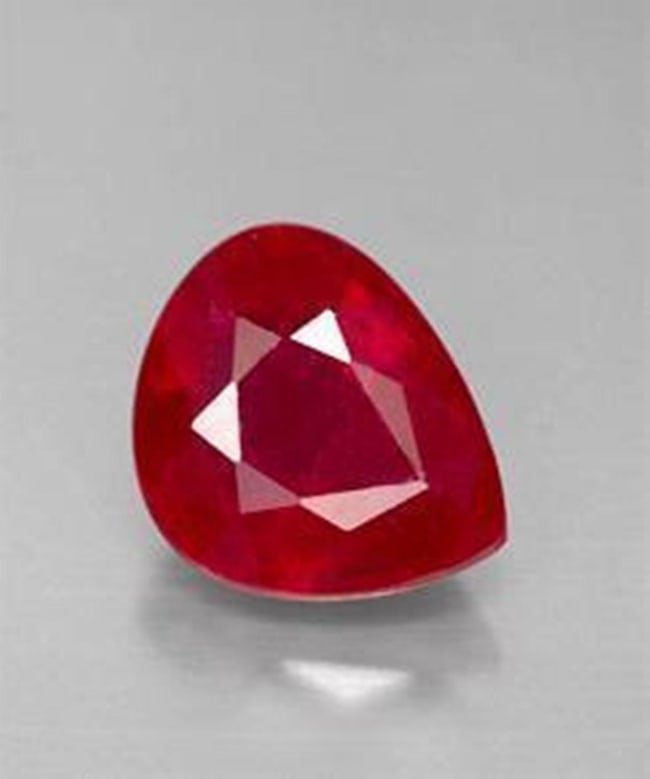 Loose Ruby Pear Shape 2.88Ct 10x6.9x4.8 mm: Gem Type: Natural Ruby Qty: 1 Pics Weight: 2.88 Carat Measurement: 10x6.9x4.8 mm Shape: Pear Clarity: Fine Cut: Facet cut Color: Red Pagan Blood Origin: Madagascar Treatment: Fracture Filed Hardness: