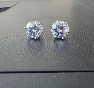 Stud Earrings Creation Diamond 8.00CT18k W/G Overlay: Gem Type: Creation, White Diamond item: 1 pair Clarity: VS1 Color: F Weight: 8.00 Carat Stone Size: 10 mm x 10 mm x Deep 6mm Shaped: Round Brilliant Setting: 4 prong Polish: Excellent Backing:
