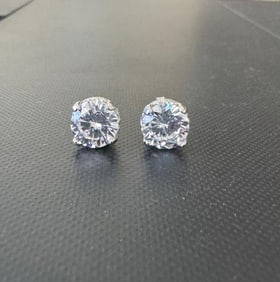 Stud Earrings Creation Diamond 4.00CT18k W/G Overlay: Gem Type: Creation, White Diamond Item: 1 pair Clarity: VS1 Color: F Weight: 4.00 Carat Stone Size: 8 mm x 8 mm x Deep 6mm Shaped: Round Brilliant Setting: 4 prong Crown Backed Design Polish: Excellen
