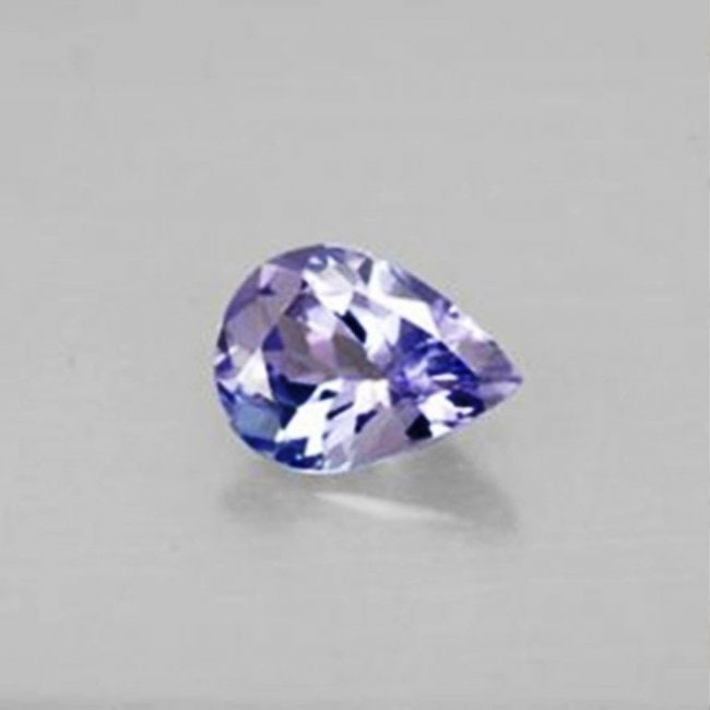 Violet/Blue Tanzanite Pearl Shape 1.17Ct 7.9x5.8x3.5 mm: Gem Type: Natural Tanzanite Qty: 1 Weight: 1.17 Carat Measurement: 7.9x5.8x3.5 mm Shape: Oval Cut: Facet cut Clarity: VS Color: Violet/Blue Treatment: None Origin: Tanzania Hardnes