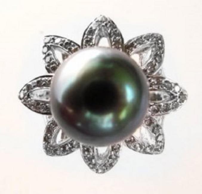 Tahitian Pearl 11mm Diamond Ring 1.48Ct 18k W/g: Gem Type: Natural Tahitian Pearl Diamonds Item: Ring Diamond: 1.48 Carat, Diamonds: 72 Pieces Round Brilliant (Clarity: SI2, Color: G) Tahitian Pearl: 11 mm Round Grade: AAA, Color: Peacock, Green, Lu