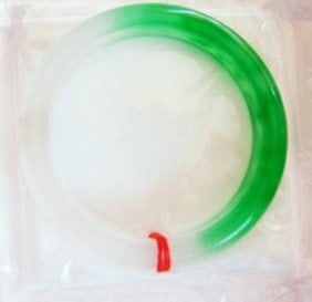 Natural Jade Bangle Grade B Size: 7.75: Gem Type: Natural Jadeite Jade Item: Jade Bangle Grade: B Two Color: Green and Lavender Texture Transparency: Semi-Transparent Shape & Cut: Solid Jade Band Halfway Round Jade Finish: Hand cut and