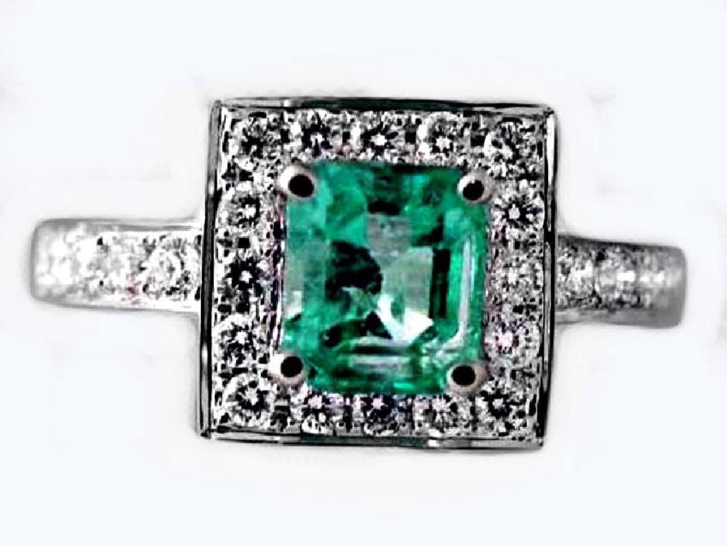 Emerald Ring 1.41CT Diamond: .68 CT14k W/G: Emerald with diamond Ring 1.41 carat genuine princess cut shape Columbia Emerald Clarity:SI,Color: Light Green,Treatment: Oiled Origin: Columbia-Hardness: 7.5 .68 carat natural round brilliant