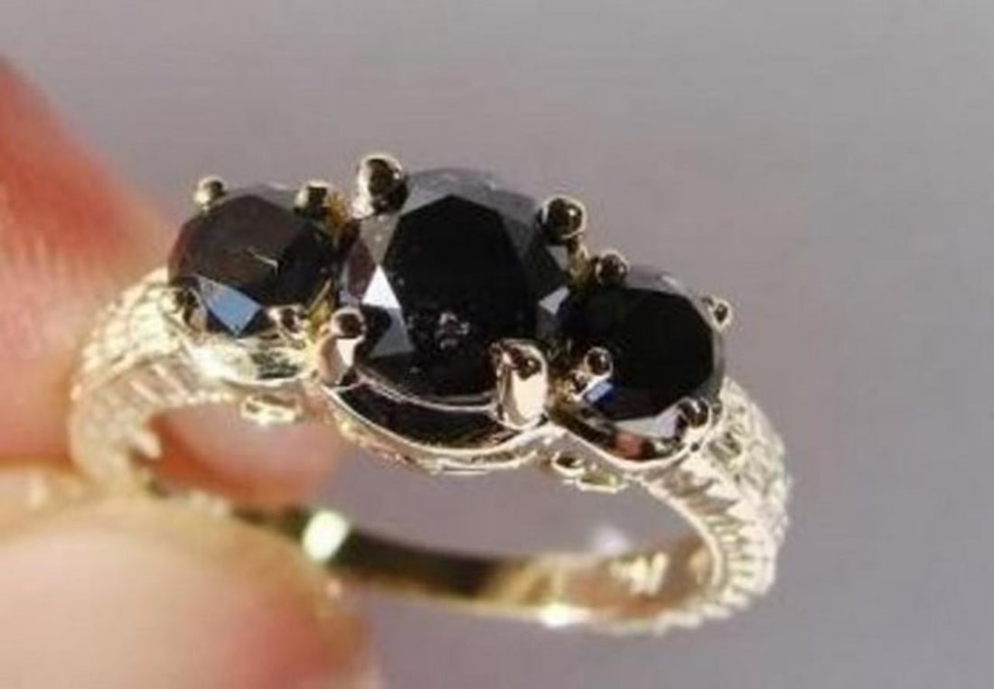 Black Diamond Ring 1.87 Carat 14K Yellow Gold: Gem Type: Natural Black Diamond Qty: 1 Condition: New Item: Ring (Size: 6) Band thickness: 3-4mm Total diamond weight: 1.87 carat round shaped Clarity: Opaque, Color: Fancy Black Metal: 14k solid yell