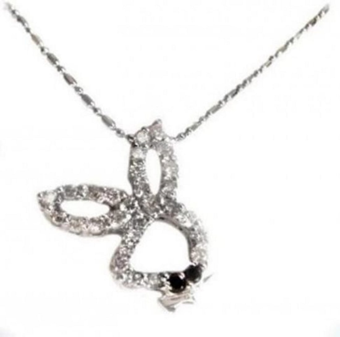 Bunny Diamond Pendant 1.20 Carat 14k W/G: Gem Type: Natural Diamond Qty:1 Item: Pendant Diamond total weight: 1.20 carat Two Type of diamond (white diamond and black diamond) White Diamond: 1.10 carat round brilliant 27 pieces Clarity: