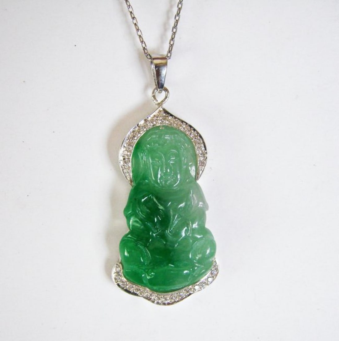 Diamond /Guanyin Jade Pendant Grade A .54Ct 14k W/g: Gems: Natural Diamond and Jade Item Pendant Measurement: H 1.75" x W .75" x Thickness .25" inch 36 Pieces Diamonds Round Brilliant Weight: .54 Carat Clarity: SI1 , Color: G , Treatment: None