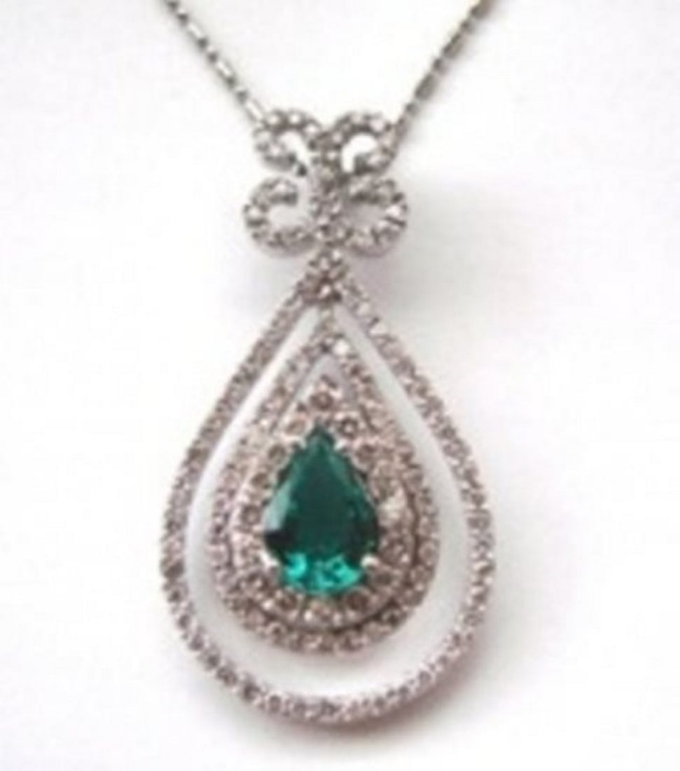 Emerald & Diamond Pendant:4.08Ct 14k W/g: Gem Type: Natural Diamond and Natural Columbia Emerald Pendant Quantity: 1 Emerald: 1.98 carat Clarity: VS Color: Green Treatment: Oiled Origin: Columbia Hardness 7 Diamond weight: 2.10 carat R