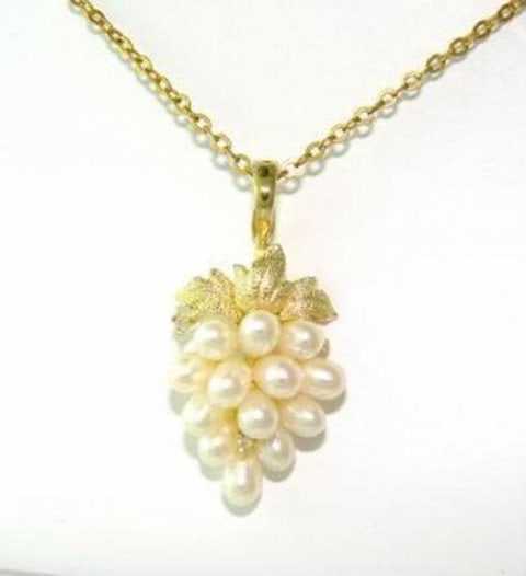 Culture Pearl Pendant 3-4mm (AA) 14k Yellow Gold: Gem Type: Natural Freshwater Culture Pearl and Diamond Qty: 1 Item: Pendant Diamond: .05 Carat round brilliant (Clarity: SI1, Color: H) Pear: 4-3mm Grade: A+ Luster: good Shaped: Oval Diameter
