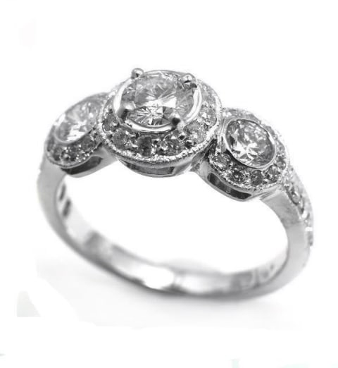 Engagement Ring 1.49 Carat 14k White Gold: Gem Type: Natural Diamond Quantity: 1 Total Weight: 1.49 carat Center Weight: .52 carat and 2 Pieces side by Side Weight:.60 Carat round brilliant (Clarity SI2 Color: I-J, Treatment: None) Mounting: .