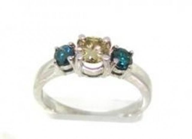 Anniversary Multi Color Diamond Ring .79 Ct14k W/g: Gem:Natural Blue/White Diamond Qty: 1 Total Weight: .79 carat Center: .42 carat round yellow brilliant diamond (Clarity: VS2-SI-1,Color: Yellow Treatment: None ) On the side diamond .37 carat round bl
