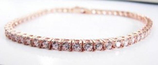 Creation Diamond Tennis Bracelet 8.40Ct 18k R/g Overlay: Creation Diamond Tennis Bracelet High Quality 56 pieces Weight:: 8.40 Carat Round Brilliant Clarity: VVS,Color: F Setting: Prong Metal: 18k Rose Gold Overlay 925 silver(4.00grm) Length: 7" Lock: Hidde