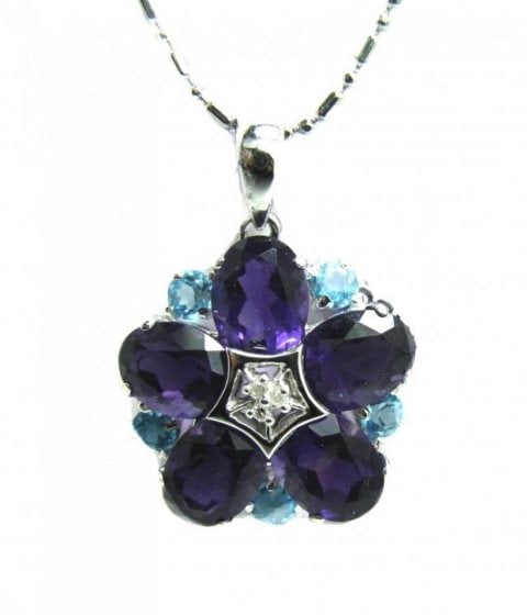 Multi-Color Pendat 3.55CT/ Dia .02Ct Pendant 14k W/g: Gem Type: Natural Blue Topaz/Amethyst and Diamond Item: Pendant Quantity: 1 Diamond: .02 carat round Amethyst: 3.25 carat Oval Shaped Blue Topaz: .30 carat round shaped Clarity: VVS Color: Swiss
