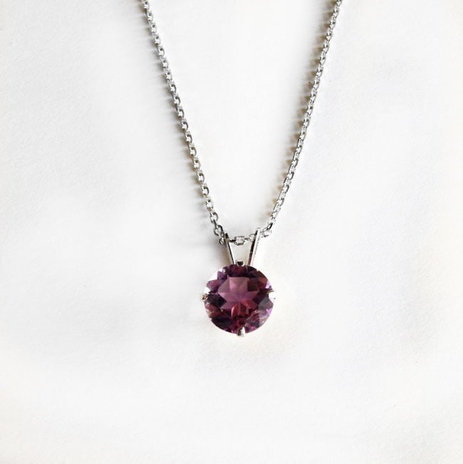 Pendant Amethyst Round 1.57Ct 14k W/g: Gem Type: Natural Amethyst Item:Pendant Weight: 1.57 Carat Round Facet Measurement: 7x4 mm Clarity: VS,Color: Purple 14K White gold and 1.98 grams Diameter: 12x8 mm Style: Unique Pendant will co