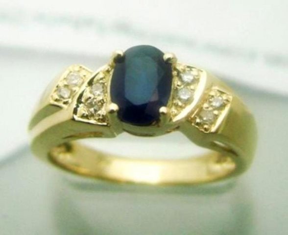 Blue Sapphire: 1.05CT, Diamond: .25CT Ring 14k Y/g: Gem: Natural Blue Sapphire and Diamond Item: Ring, Size: 6.5 Blue Sapphire Weight: 1.05 Carat Shape/Cut: Oval Facet Clarity: VS, Color: Blue,Treatment: Heated Origin: Sri Lanka (Ceylon) 8 Pieces Diamo