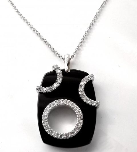 Onyx Diamond Creation Pendant 15.50Ct 18k W/g over: Gem Stone: Onyx and Diamond Creation High Quality Quantity: 1 Item: Pendant Come With Chain 17"inch Size: 1.25"x1.3/4" Stone: Approximately .50 Carat round brilliant Clarity: VS1, Color: F Shape