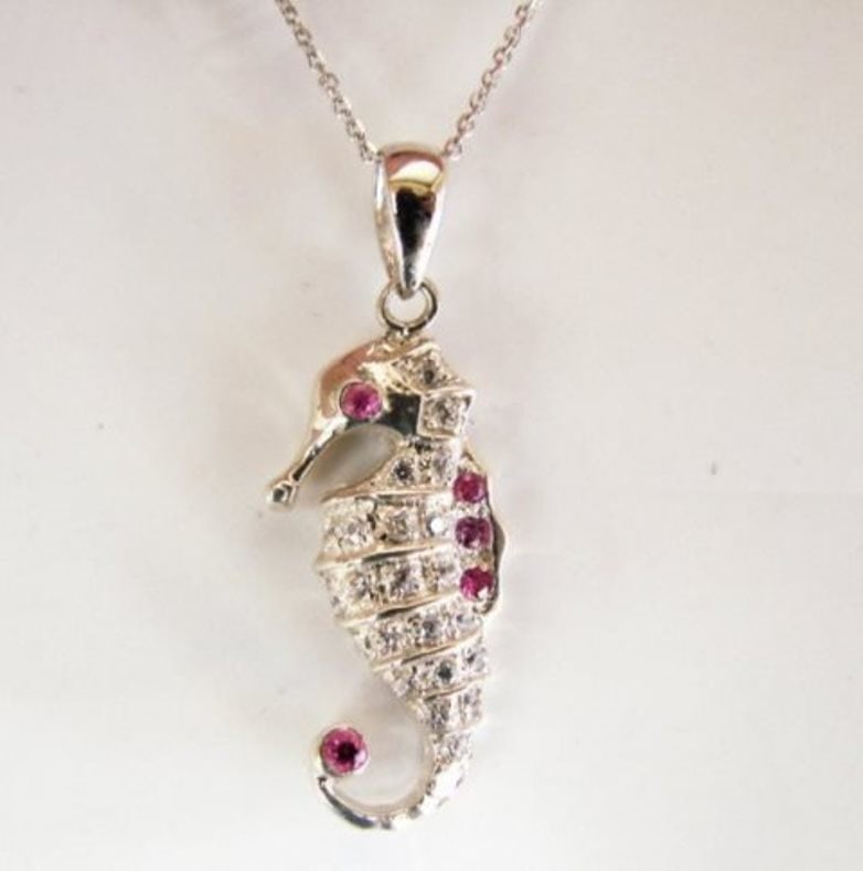 Sea Horse Pendant .48Ct 18k Overlay 925: Gems Type: Natural Pink Sapphire & Creation Diamond Sea Horse Pendant and High Quality Item Item: Pendant Creation Diamond : .33 carat Round brilliant Clarity: VVS, Color: F 5 Pieces, Pink Sapphire, W