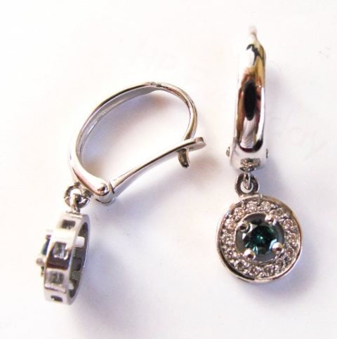 Blue- White Dia: Earrings Dangle 1.16 Ct 14k W/g: Gem Type: blue & White diamond Quantity: 1 Pair Total Diamond Weight: 1.16 Blue Diamond: .66 carat round shape (clarity: SI3, Color: Fancy Blue/Green, Treatment: Enhanced) White Diamond .50 carat roun