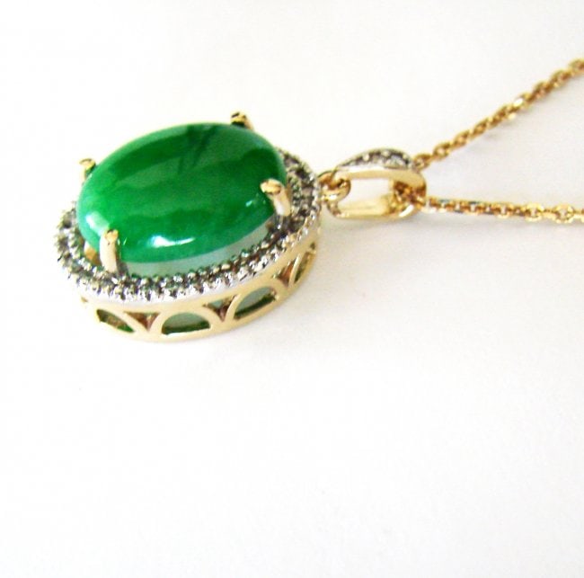 Diamond/Jadeite Jade Grade A Pendant 8.38Ct 14k Y/g: Gems: Natural Diamond and Jadeite Jade Item Pendant Measurement: L 1.75" x W .75" inch 35 Pieces Diamonds Round Brilliant Weight: .56 Carat Clarity: SI1, Color: G, Treatment: None Weight: 7.82 Carat G