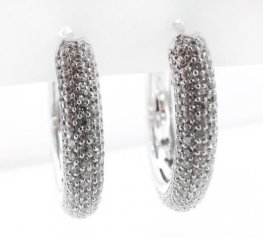 Diamond Creation Hoop Earrings 3.10Ct 18k W/G Overlay: Creation Diamond Hoop Earrings and High Quality items Quantity: 1 Pair Item: Hoop Earrings Stone: 3.10 carat round Brilliant (Clarity: VVS, Color: F) Diameter: 1.2"5x1.25" Setting: Micro Pave 18k Whit