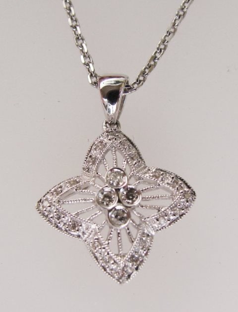 Star Diamonds Pendant .30Ct 14k W/g: Star Design Diamonds Pendants Quantity: 1 24 Pieces Round Brilliant Weight: .30 Carat Clarity: VS2 Color: G Treatment: None Metal: 14k white gold Weight: 3.23 grams Style: Star Design ver