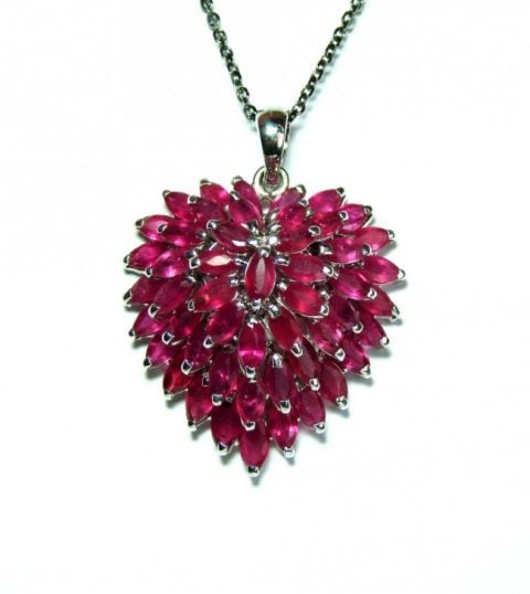Natural Ruby Marquise Pendant 13.45Ct 18k W/g Overlay 925 Silver: Gem Type: Natural Ruby Item: Pendant 50 Pieces, Marquise Shape Weight: 13.45 Carat Clarity: Transparent Color: Pink Red Treatment: Heated, Origin: Thailand Metal: 18k White Gold Overlay 925 Silver