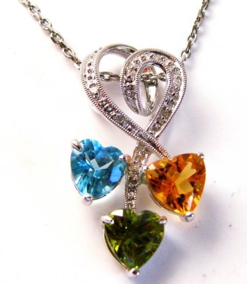 Multi Color Design Diamond Pendant:1.75Ct 14K W/G: Gem Type: Natural Culture Pearl Diamonds Qty: 1 pair Item: Gem Type: Natural Peridot/Blue Topaz/Citrine / Diamonds Heart Design Pendants Quantity: 1 7 Pieces Round Brilliant Weight: .07 Carat Clarity: