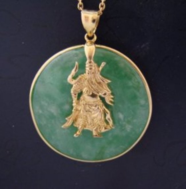 Guangong Donut Jade Pendant 14k Y/g: Natural Jadeite Jade Grade: A Item : Pendants Style: Gunkong Lucky Charm 14k Yellow Gold Weight: 3.18 grams Size: H 1.5" x W 1.25" Estimated Value Price: $6,490 Item will come with appraisal inside th