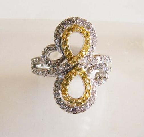 Creation Diamonds Ring 1.25ct 18k W/g Overlay: Gem Type:Creation Diamonds High Quality Item Item : Ring (Size: 7) Creation Yellow and White Diamonds Total Weight: 1.25 carat Round Brilliant Clarity: VVS1, Color: D 18k White and Yellow gold