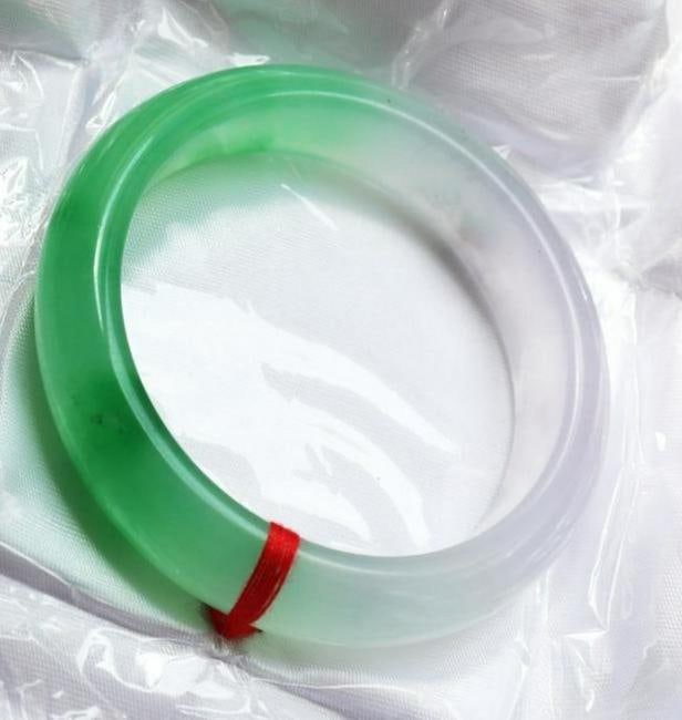 Natural Jadeite Jade Bangle Grade B Size 7.75: Natural Jadeite Jade Bangle Grade: B, Color: Green an Lavender texture Transparency: Semi -Transparent Shape & Cut: Solid Jade Band Haft Round Jade Finish: High Polish Quality: Excellent Look Beautifu