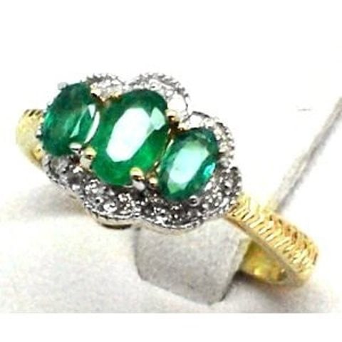 Anniversary Emerald Diamond Ring 1.40CT 14k Y/G: Diamond: .30 carat round brilliant (Clarity: SI-1, Color: H, Treatment: None) Emerald: 1.10 carat oval Facet Clarity: SI, Color: Green,Treatment: None Origin: Columbia Hardness: 7 Metal: 14k Yellow