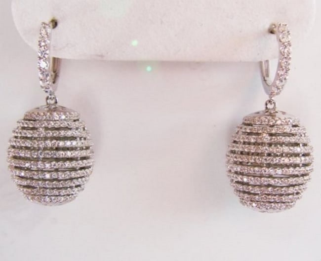 Creation Diamond Dangle Earrings 2.45Ct 18k W/G Overlay 925: Creation Diamond Earrings and High Quality Clarity: VVS,Color: F Stone: Approx 2.45 carat Round Brilliant Item: Earrings Dangle Shape Length: 1.25"x 1/2"inch 18k white gold Overlay 925 silver Weight: 