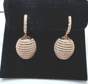 Creation Diamond Dangle Earring 2.45Ct 18k R/g Overlay: Creation Diamond Earrings and High Quality Clarity: VVS, Color: F Stone: Approx. 2.45 carat Round Brilliant Item: Earrings Length: 1.25"x 1/2"inch 18k Rose gold Overlay 925 silver weight: 8.56 grams,