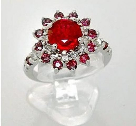 Anniversary Ruby Diamond Ring 4.86Ct 14k W/g: Gem Type: Natural Ruby and Diamonds Item: Ring (Size: 6) Diamond 16 pieces Weight: .62 carat Round brilliant Clarity SI2, Color: H, Treatment: None Ruby 14 Pieces Round , Weight: 1.94 Carat Clarity: V