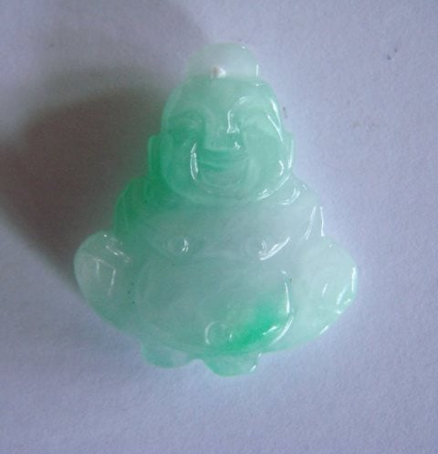 Natural Jade Buddha Figurine Pendant Grade B: Gems: Natural Jade Qty: 1 Design Faces Both Side Grade: B Item Type: Pendant Origin: China (Mainland) Color: Green and White Weight: 4.7 grams Size: H 28 x W 28m Thickness: 5.8m La