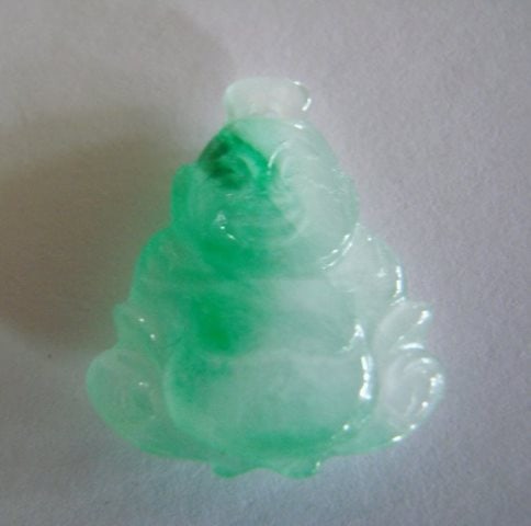 Natural Jade Buddha Figurine Pendant Grade B: Gems: Natural Jade Qty: 1 Design Faces Both Side Grade: B Item Type: Pendant Origin: China (Mainland) Color: Green and White Weight: 3.7 grams Thickness: 5.5mm Laughing Buddha is also kn