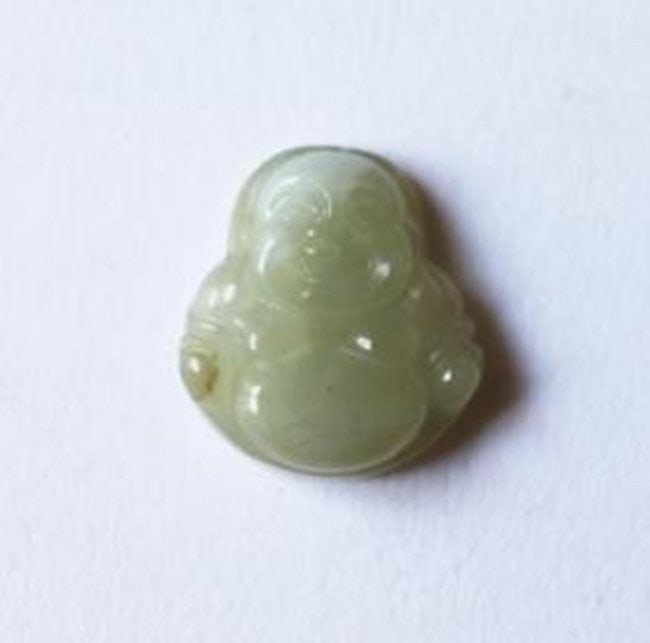 Natural Jadeite Jade Buddha Figurine Pendant Grade: Gems: Natural Jadeite Jade Design Back Side Smooth Grade: A Item Type: Pendant Origin: China (Mainland) Color: Ice White Weight: 3.10 grams Size:H 18.2 x W 16.4 mm Thickness: 5.2 mm Laugh