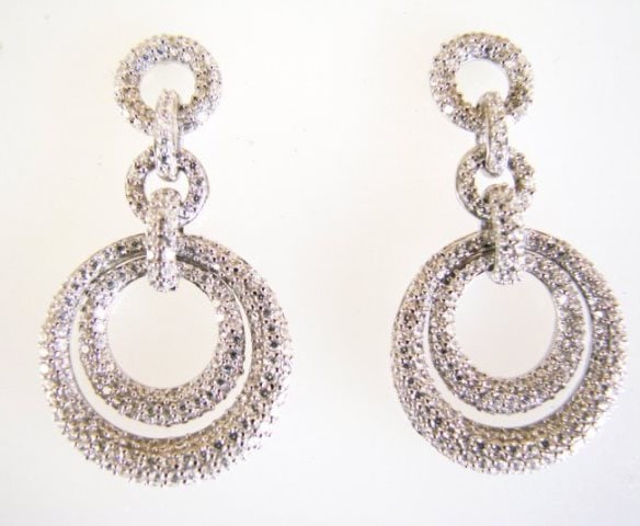 Creation Diamond Earring 4.12Ct 18k W/g Overlay: Creation Diamond High Quality Earrings Weight: 4.12 carat round shape Clarity: VVS, Color: F Length: 1.1/2" x Width: 3/4" 18k White gold overlay 925 silver Weight: 10.60 grams Post/Backing Gende