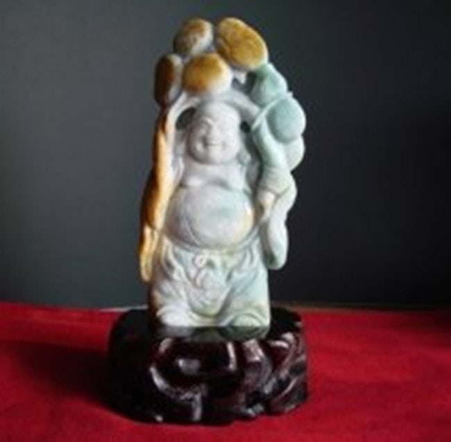Natural Chinese Carved Jade Buddha Grade A: Item: Natural Carved Jade Buddha 19th Century Length: 163mm, Width: 70mm, Thickness: 20mm Grade: A Total weight: 1 pounds Color: Green and Creamy, Brown texture Treatment: Untreated Luster: Excellent 