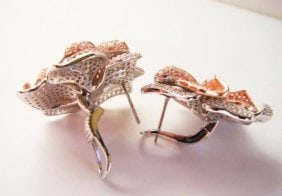 Creation Diamond Earring 9.60Ct 18k W-R/g Overlay: Gem Type: Creation Diamond High Quality Item Item: Earrings, Weight: 9.60 carat Clarity: VVS1-Color F Setting name: Micro Pave-Two Ton Color Metal: 18k White and Rose gold overlay of 925 silver Weight
