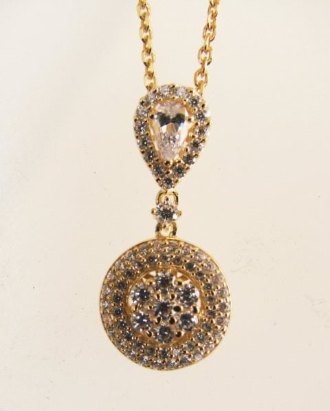 Creation Diamond Pendant 1.00Ct 18k Y/g Overlay: Gem Type: Diamonds Creation High Quality Item Item:Pendants Weight: 1.00 carat Pear and Round Brilliant (Clarity: VVS-Color F) Setting name: Micro Pave Metal: 18k Yellow gold overlay 925 silver Weight